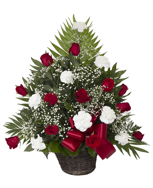 A one-sided basket arrangement suitable to be sent to a funeral or memorial service with roses, carnations, babies breath, and a bow. 28 inchH x 24 inchW