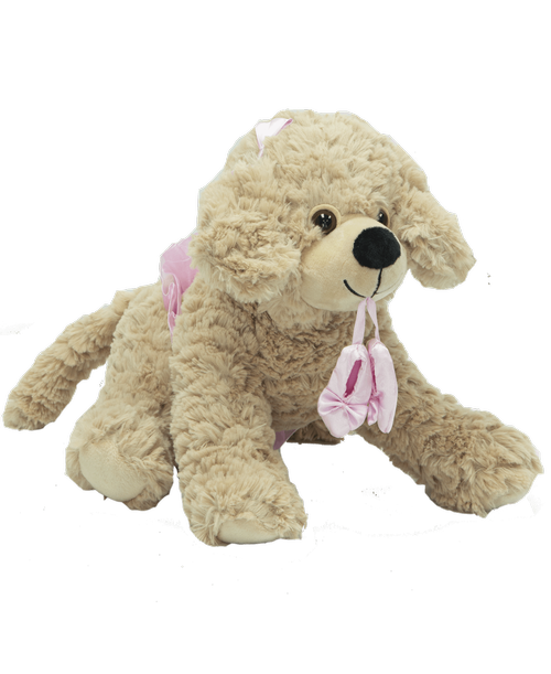A 12 inch tan plush dog wearing a pink tutu and a pink bow and is holding ballerina shoes