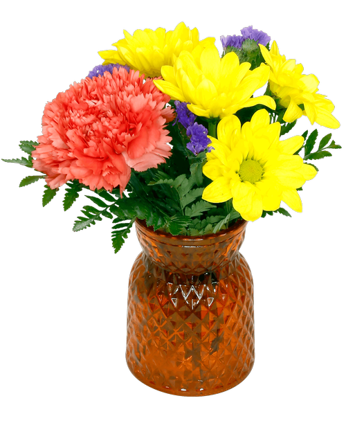 A 4.5 inchH orange glass vase with a diamond pattern holds an all-around arrangement with a carnation, daisy poms, and statice. 7 inchH x 6 inchW