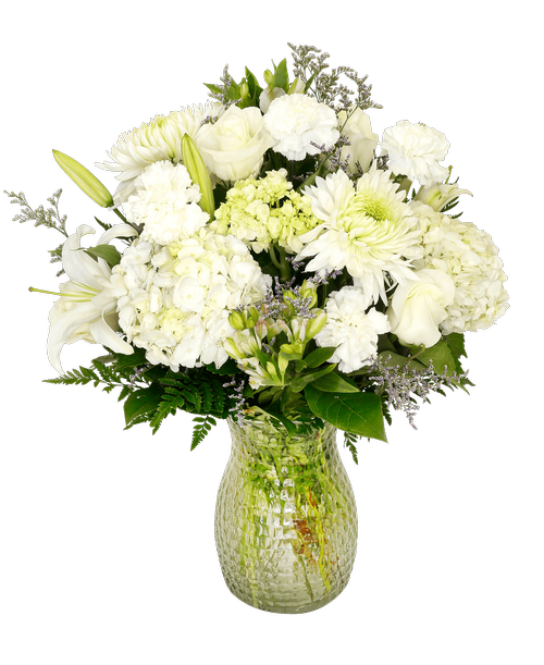 A 10 inch pebbled glass vase holds an all around arrangement including four roses, hydrangea, mini green hydrangea, lilies, charmelia alstroemeria, football mums, carnations, and caspia. 23 inchH x 14 inchW