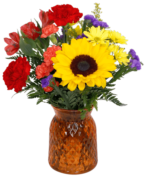 A 6.5 inchH orange glass vase with a diamond pattern holds an all around arrangement with a sunflower, carnations, mini carnations, alstroemeria, daisy poms, solidago and statice. 14 inchH x 10 inchW