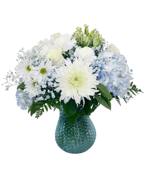 A 7.5 inch blue dimpled glass vase holds an all-around arrangement with three roses, a football mum, hydrangea, charmelia alstroemeria, carnations, daisy poms, and blue-dyed baby's breath. 15.5 inchH x 13 inchW