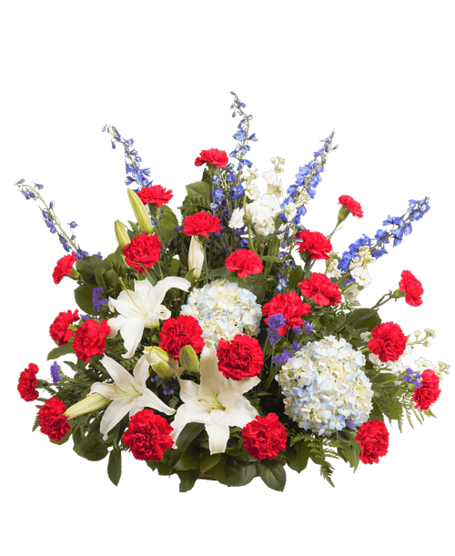 A one-sided Patriotic arrangement designed in a basket, suitable to be sent to a funeral or memorial service, with lilies, hydrangea, delphinium, stock, carnations, and statice. 27 inchH x 30 inchW