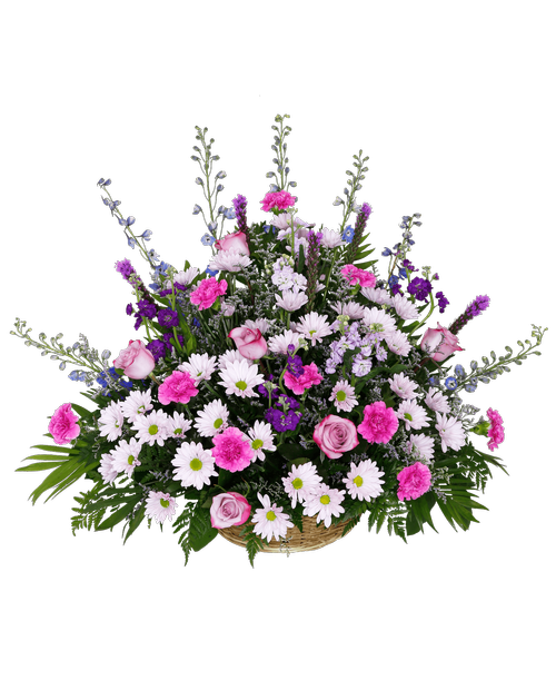A one-sided arrangement designed in a 14 inch basket, suitable to be sent to a funeral or memorial service, with roses, delphinium, stock, liatris, carnations, daisy poms, and caspia. Overall 28 inchH x 37 inchW
