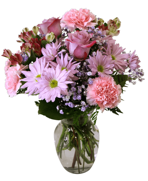 An 8 inchH glass vase holds an all around arrangement with two lavender roses, pink carnations, pink charmelia alstroemeria, lavender daisy poms, and purple dyed baby's breath. 17 inchH x 13 inchW