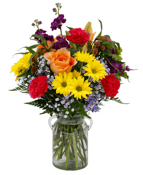 A 7 inchH glass vase with ear handles holds an all around arrangement with two orange roses, purple stock, a mini green hydrangea, orange lilies, pink alstroemeria, hot pink carnations, yellow daisy poms, and purple dyed baby's breath. 21 inchH x 15 inchW