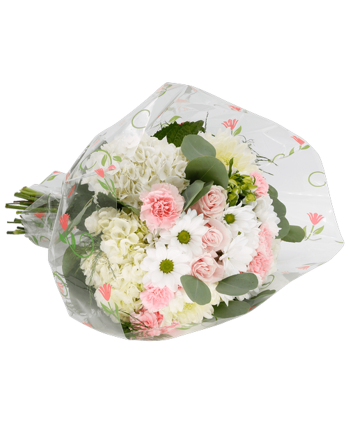 A fresh gathered bouquet with three pink roses, white football mums, white hydrangea, white daisy poms, pink carnations, pink mini carnations, white charmelia alstroemeria, tree fern, and silver dollar eucalyptus wrapped in a sleeve and tied with raffia.
