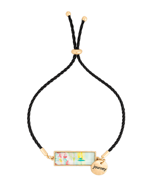 Incorporate inspiration throughout the day with the ArtLifting Bracelet-Poppy Keshi. Crafted by a talented designer, this bracelet boosts vibrant imagery and an encouraging charm 'Journey', with an adjustable strap for easy wearing. A unique gift for her, or a little sweet something for yourself! Size: 1/4 inchw x 1 inchlong pendant with 5 inchlong chain (adjustable); Created by Midori 