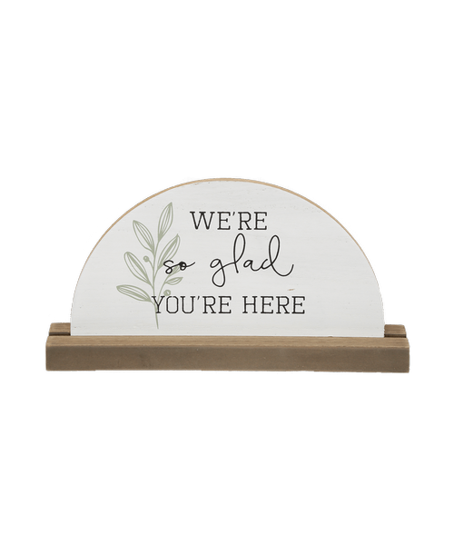 Wood Black and White Word Dome Stand with the saying 'We're so glad you're here' 5 inchH x 9.5 inchW x 1.5 inchD