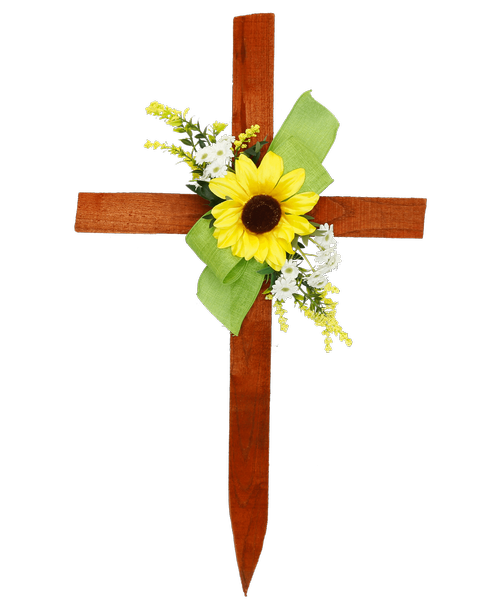 A 24 inchH wooden cross holds a silk sun flower, white mini daisies, yellow berries, and a lime green bow. 