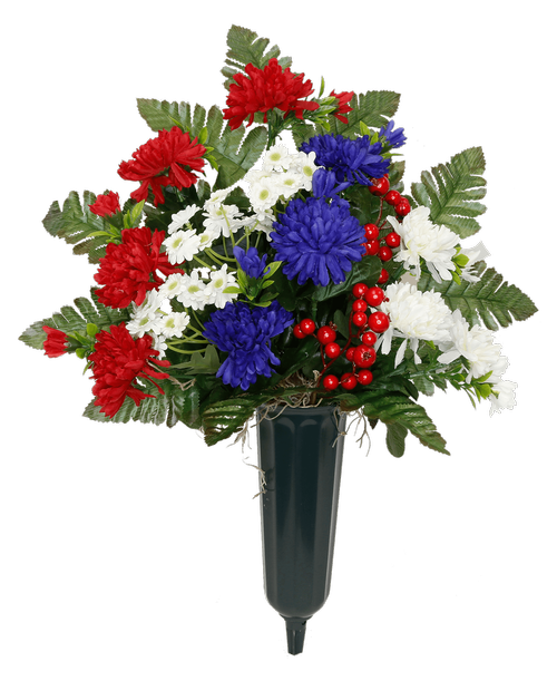 A plastic cemetery spike holds a one-sided silk arrangement with red, white, and blue flowers, including mums, mini daisies, and red berries. 19 inchH x 14 inchW