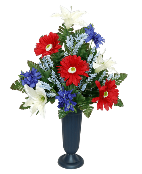 A plastic cemetery cup holds a one-sided silk arrangement with red, white and blue flowers including lilies, gerbera daisies, cornflower, and astilbe. 23 inchH x 17 inchW