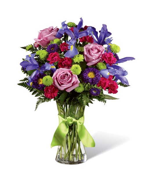 Share a world blooming in brilliant color and undeniable texture with this frilly and fun fresh flower bouquet . Blue iris, burgundy mini carnations, green button poms, lavender carnations, purple matsumoto asters, lavender roses, and lush greens mingle together to create a fascinating display. Presented in a modern clear glass vase tied with a lime green satin ribbon at the neck, this gift of flowers is a special surprise your recipient will love. Approx. 17 inchH x 12 inchW.