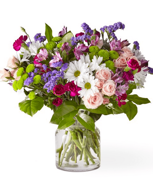 The best things in life are sweet, vibrant and blooming with freshness. Wild Berry Bouquet embodies all that and more with its rich blend of white, pink and purple florals to create the perfect impression. 17 inchhx20 inchw