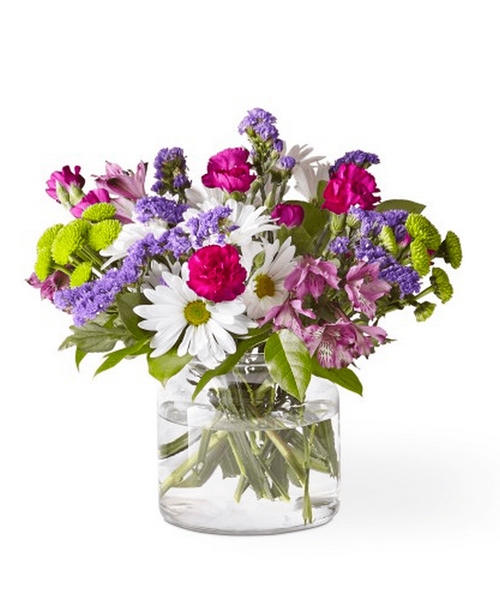 The best things in life are sweet, vibrant and blooming with freshness. Wild Berry Bouquet embodies all that and more with its rich blend of white, pink and purple florals to create the perfect impression. 12 inchhx13 inchw
