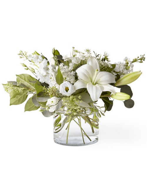 An illuminating array of florals brings an air of elegance to any room it's placed. 14 inchHx16 inchW