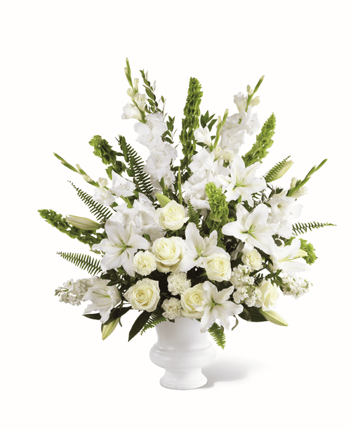 Our local florists combine soft, elegant and serene blooms t create our Morning Stars Arrangement. It features a collection of lilies, stock and roses in an array of ivory and white shades. Whether you’re celebrating the memory of a dear friend or cherished loved one, each bloom is the perfect expression of your sympathy. 
- Details:
Good arrangement is approximately 36 inchH x 30 inchW 
Better arrangement is approximately 40 inchH x 32 inchW 
Best arrangement is approximately 45 inchH x 36 inchW