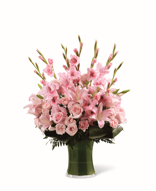Share your support by sending a classic arrangement of pink blooms and lush greens. This delicate arrangement comes crafted with an elegant mix of lilies, roses and gladiolus t send messages of comfort with charm and grace. 
- Details:
Good bouquet is approximately 27 inchH x 17 inchW 
Better bouquet is approximately 28 inchH x 19 inchW 
Best bouquet is approximately 30 inchH x 22 inchW 