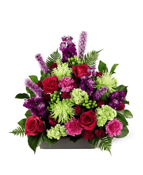 Elegant blooms are beautifully crafted to convey your messages of sympathy. 20 inchHx19 inchW
