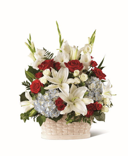 Honor the life of a true her with patriotic blooms in a classic white basket. Our local florists handcraft a collection of roses, lilies and hydrangea in a beautiful tribute that showcases your devotion and love. This hand delivered arrangement makes an appropriate piece t send t a home, memorial service or funeral. 
- Details:
Good basket is approximately 25 inchH x 19 inchW 
Better basket is approximately 27 inchH x 19 inchW 
Best basket is approximately 27 inchH x 21 inchW 