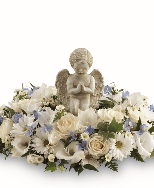 Send comfort and love t those experience the pain of losing a loved one. The Little Angel Ring of Flowers shares your support and brings solace t those going through a difficult time. It is handcrafted by a local florist with roses, delphinium, pompons and gladiolus around a stonecast angel cherub. 
- Details:
Ring is approximately 18 inch in diameter 