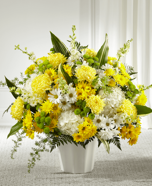 Every bloom in our Unity & Grace Floor Basket reminds us of the brightness of their spirit. This stunning arrangement features an uplifting mix of hydrangea, larkspur, daisy pompons and mums. Each arrangement is handcrafted and hand delivered by a local florist, making it a touching gesture for loved ones. 
Good floor basket is approximately 26 inchH x 24 inchW 
Better floor basket is approximately 28 inchH x 26 inchW 