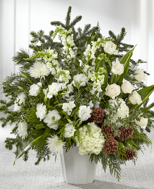 A display of pure white flowers offers your sentiment in a meaningful way when you cannot find the words. Beautiful assorted seasonal greens add texture t an array of hydrangea, roses, lisianthus and Fuji mums. A rustic accent of pinecones completes our stunning Heavenly Love Floor Basket with comfort and warmth. 
- Details:
Good basket is approximately 29 inchH x 27 inchW 
Better basket is approximately 34 inchH x 31 inchW 