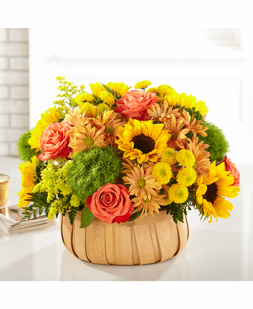 Rustic, natural beauty and vibrant shades are used t create our Harvest Sunflower Basket. A mix of bold sunflowers, roses and dianthus complement your most heartfelt messages.
13 inchH x 17 inchW 

