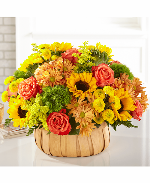 Rustic, natural beauty and vibrant shades are used t create our Harvest Sunflower Basket. A mix of bold sunflowers, roses and dianthus complement your most heartfelt messages of comfort during times of sensitivity. 
- Details:
Good basket is approximately 11 inchH x 15 inchW 
Better basket is approximately 13 inchH x 17 inchW 
Best basket is approximately 14 inchH x 18 inchW 