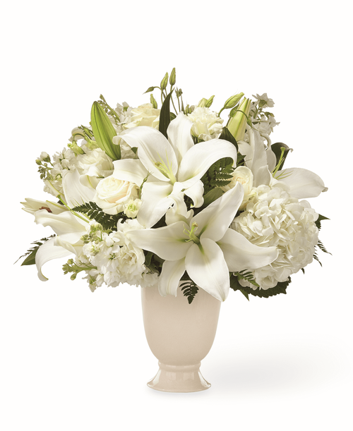 A stunning bouquet is a thoughtful way to send your condolences during difficult times. Our local florists handcraft each lily, hydrangea and lisianthus in the Remembrance Bouquet to share your sympathy. While the lilies may initially arrive in bud form, they transform into bursting flowers as they open. Good bouquet is approx. 18 inchH x 18 inchW Better bouquet is approx. 19 inchH x 19 inchW Best bouquet is approx. 20 inchH x 20 inchW 
